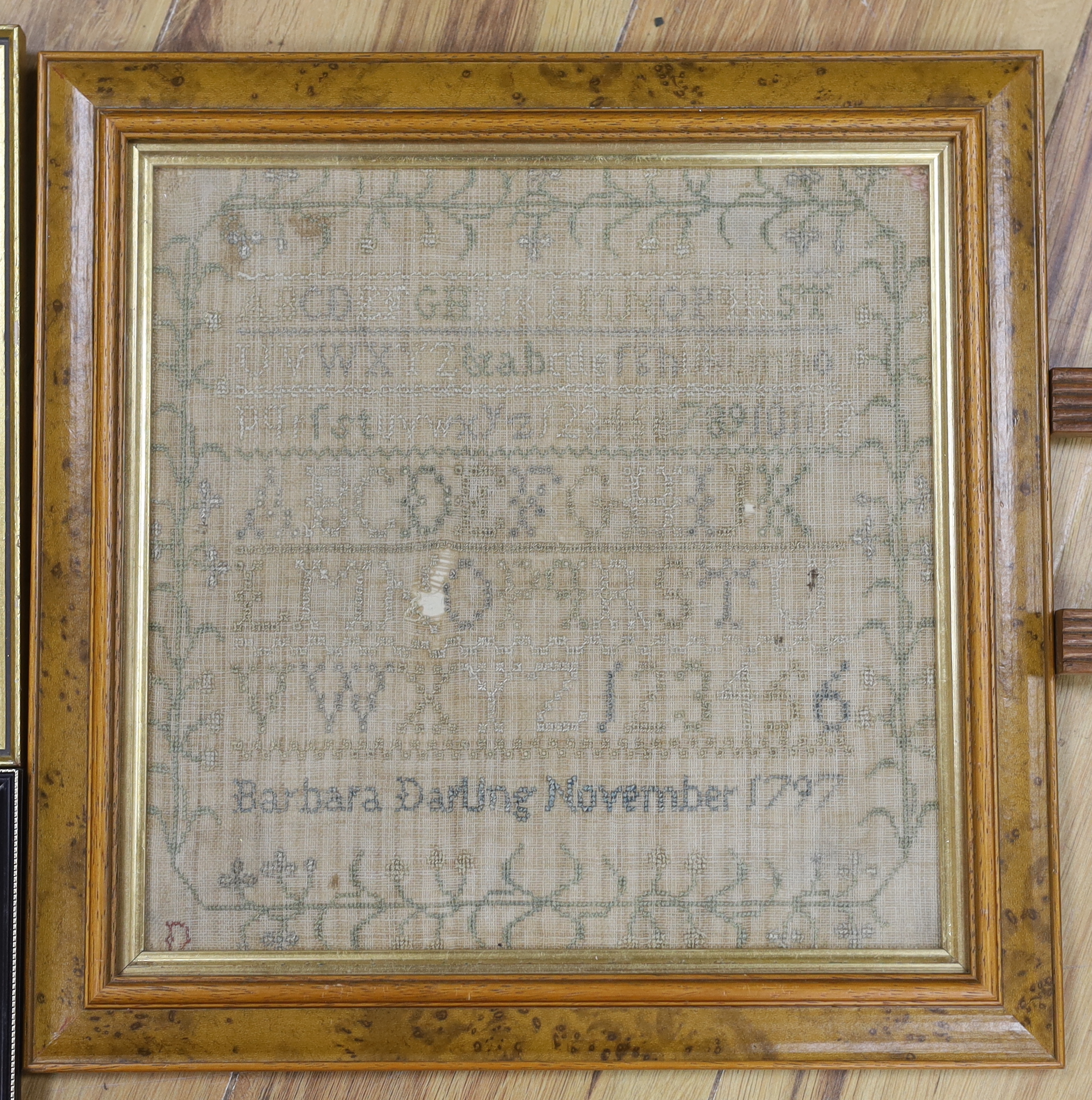 A George III dated 1797 framed alphabet sampler, by Barbara Darling and two similar dated samplers 1825 and 1828 by Elizabeth Kidd, together with a later undated 19th century sampler by Jane Kennedy (4)